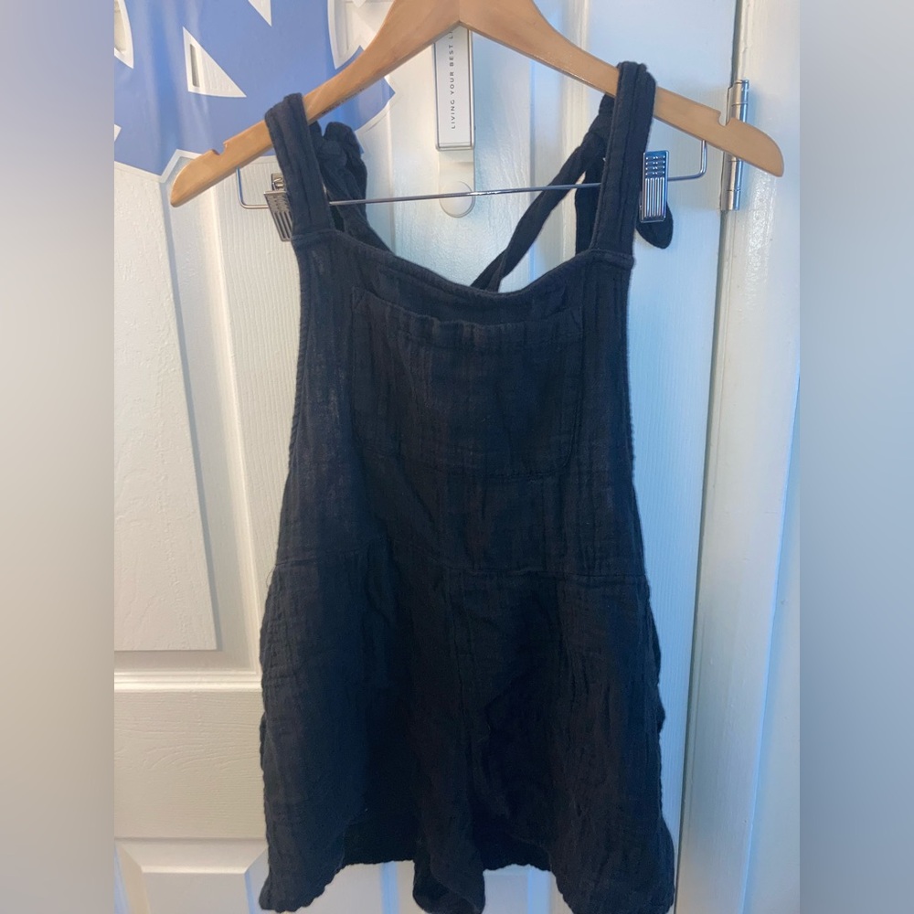 SO Black Sleeveless Romper with pockets.